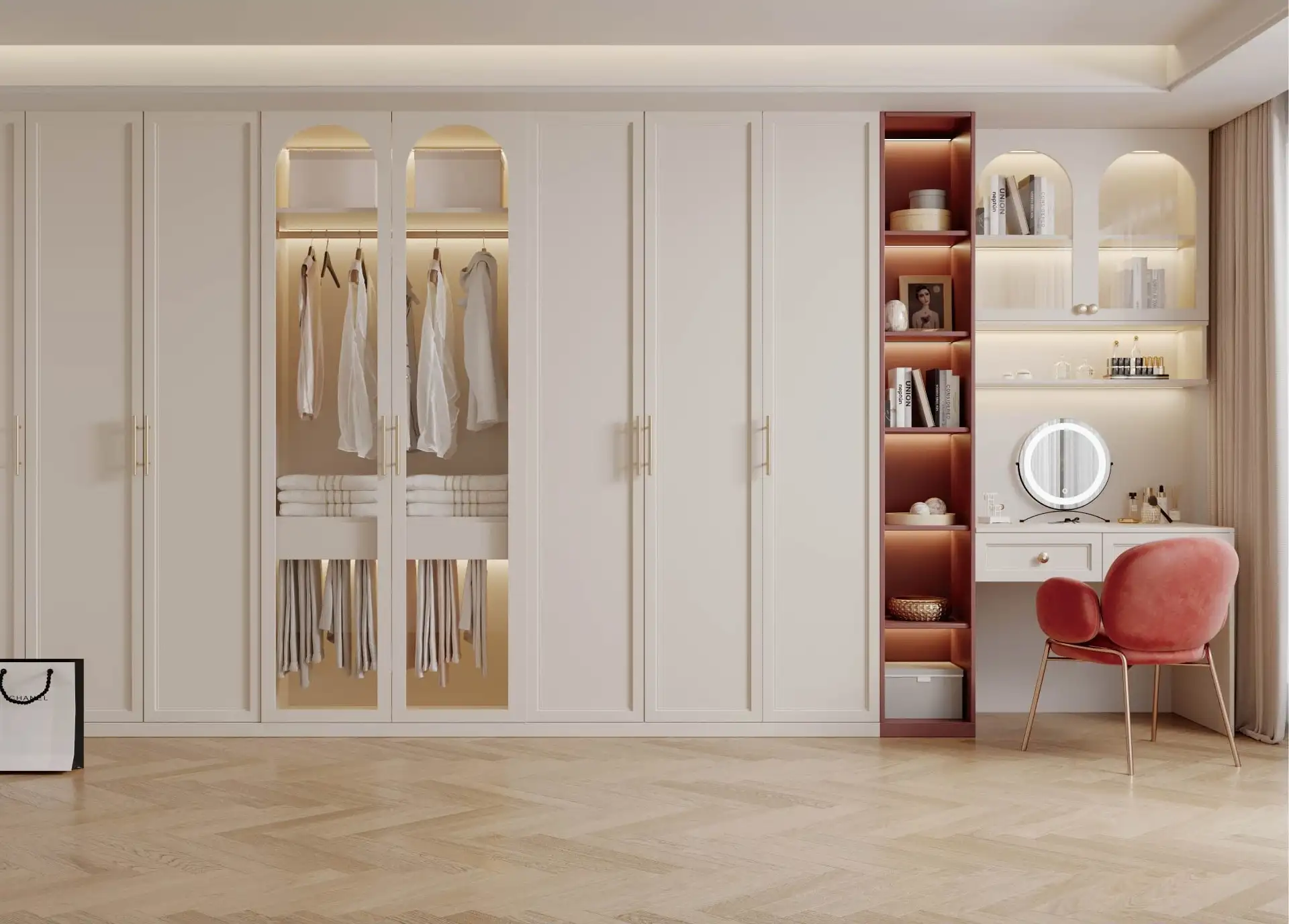 Cream wardrobes with glazed doors beside a terracotta display unit and dressing table