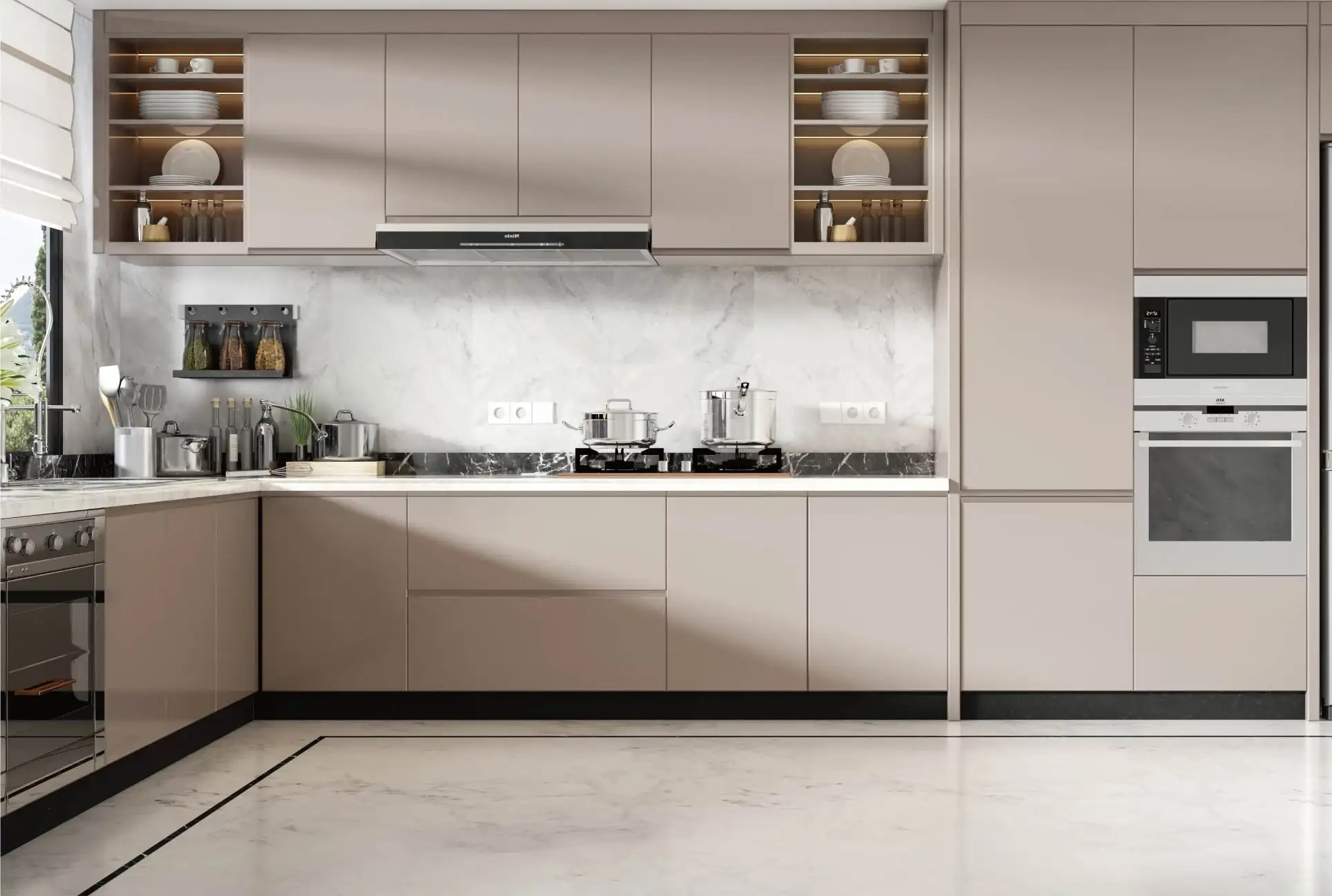 Taupe handleless kitchen with a marble backsplash and integrated wall ovens